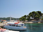 Little harbour Skiathos-stad, on the achtergrond Bourtzi - Photo JustGreece.com